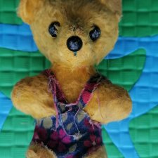 Мишка плюшевый.