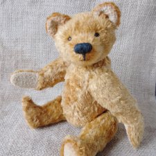 Мишка плюшевый