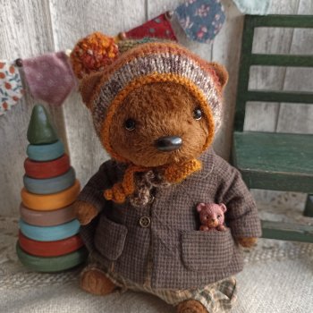 Медвежонок Ози.