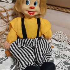 Клоун на качелях