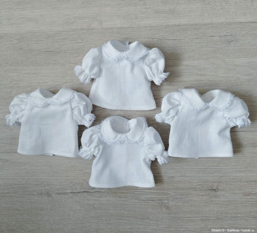 Белые блузочки снова в топе (фото 3)