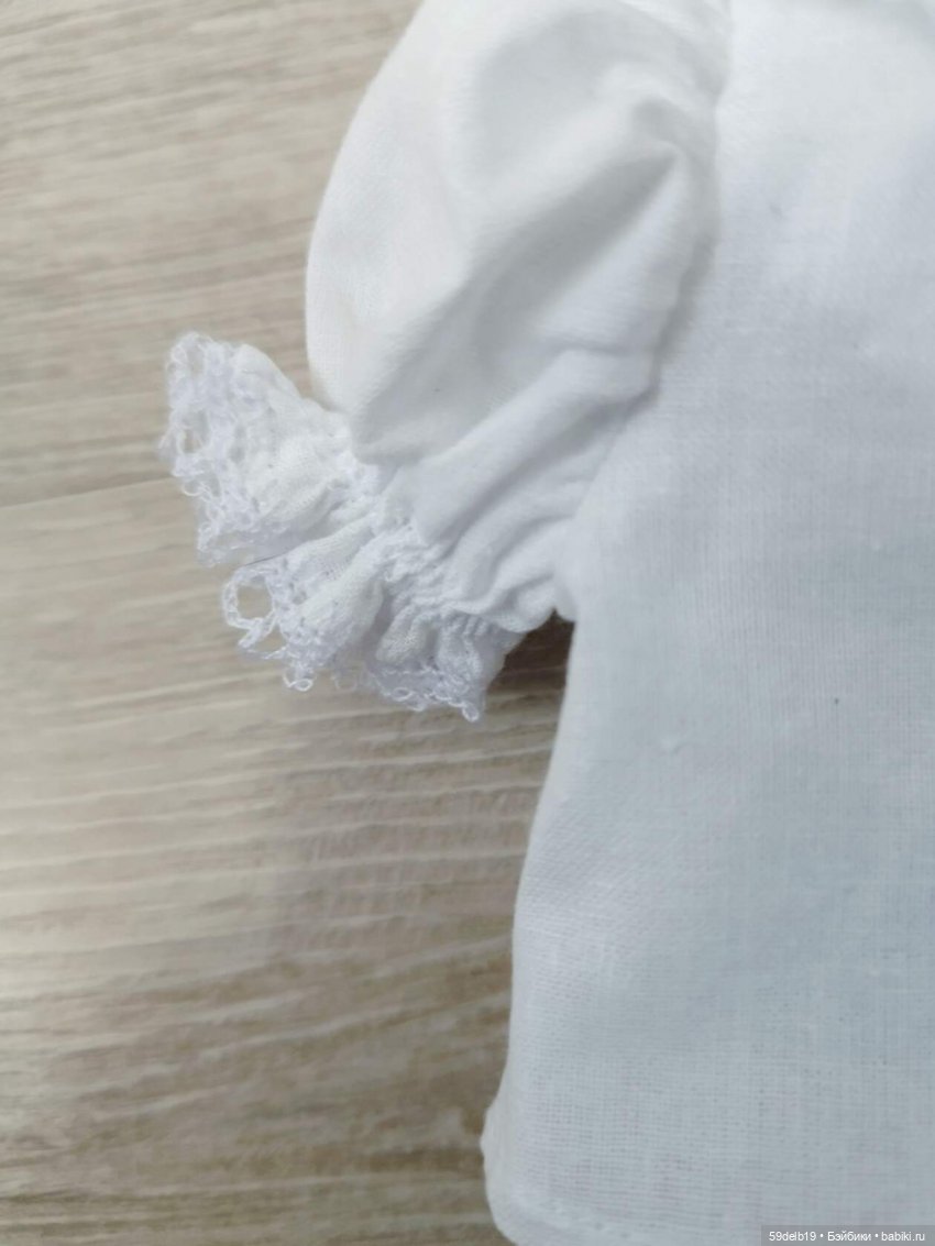 Белые блузочки снова в топе (фото 6)