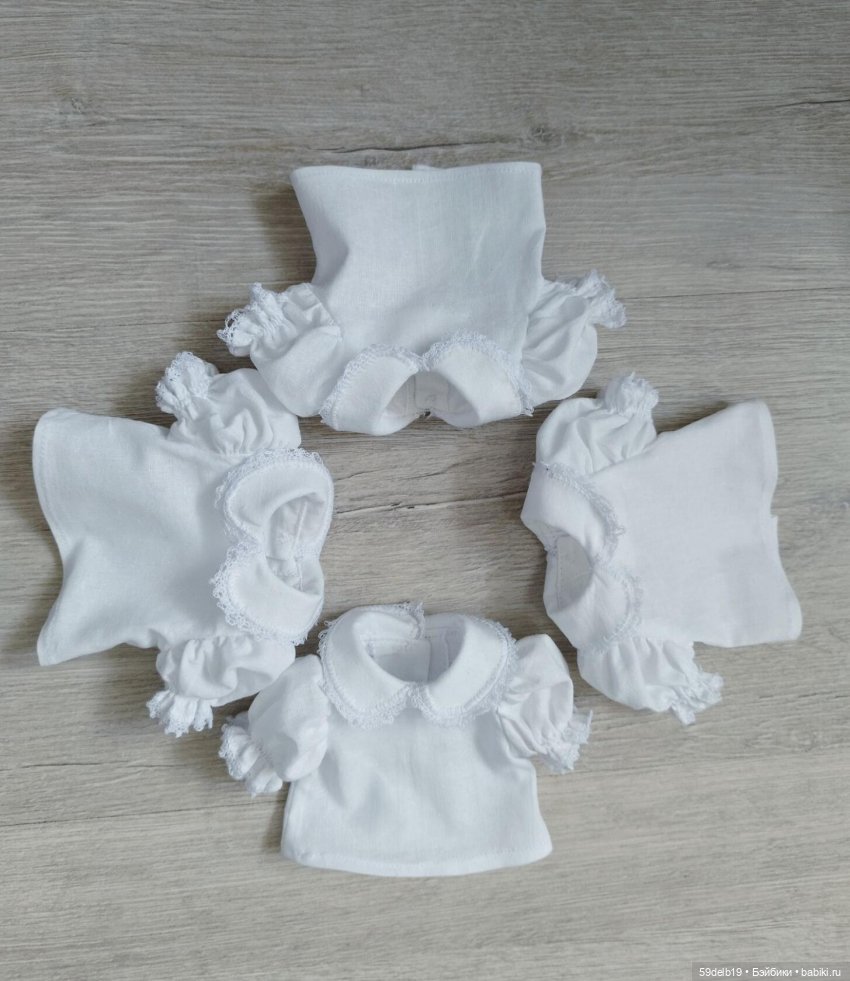 Белые блузочки снова в топе (фото 4)