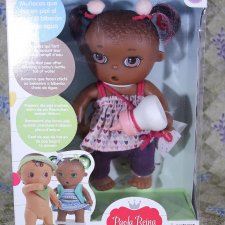 Пупс-девочка с бутылочкой и задорными хвостиками, давно не выпускается.