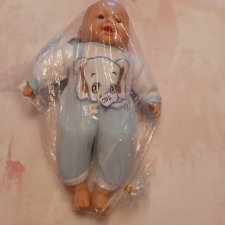 Самый обаятельный пупс хохотун