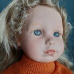 блондиночка с кудряшками Nelly