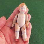 Антикварная куколка . Германия. Фарфор. 10 см