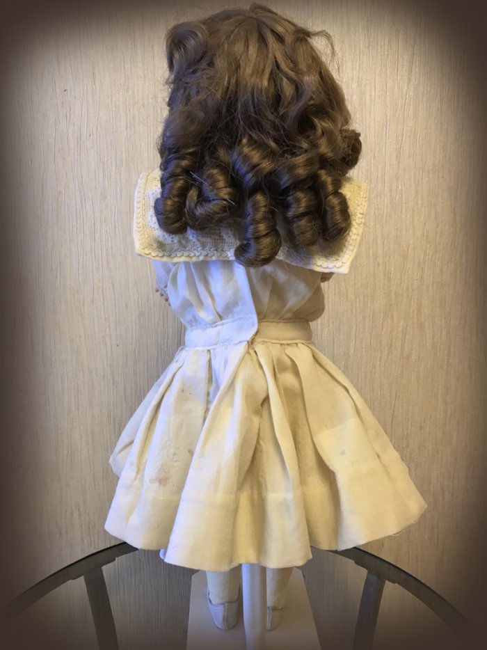 Лечение антикварной куклы Саши