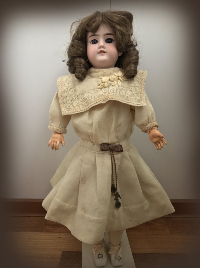 Лечение антикварной куклы Саши