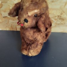 Собака, щенок плюшевый ищет новый дом.