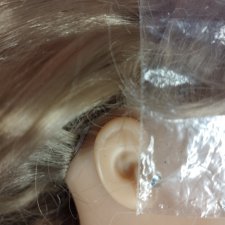 Как вживить камень в мочку уха? Вопрос