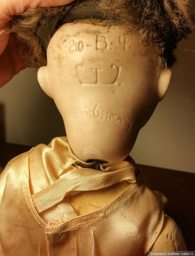 Опознание антикварной куклы