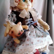 Куколка с котиком