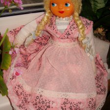 Польская кукла с целлулоидным лицом и шелковыми косами.