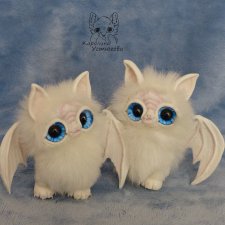 Белые летучие мышки