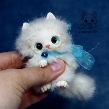 Котенок Снежок