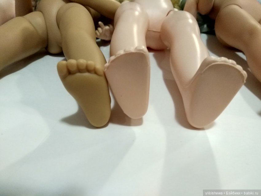 Сравнение кукол разных лет и производителей (фото 8)