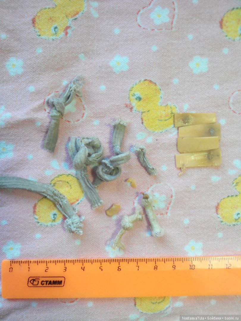 Перетяжка резинки у целлулоидной куклы (фото 8)