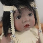 Редкий полностью фарфоровый коллекционный авторский этнический малыш от Линды Рик