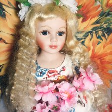 Фарфоровая кукла после реставрации