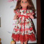 Очень красивое, яркое, нарядное платье с кружевом для кукол ростом 60-65 см.