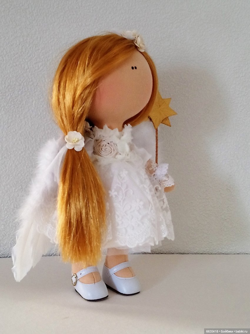 кукла без рта и носа