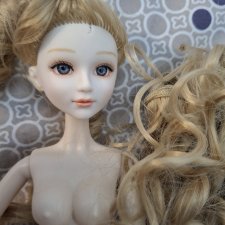 Кукла из магазина Кари