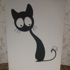 Чёрная кошка бежала по дорожке