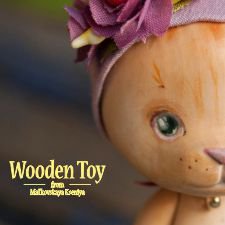 Деревянная кошечка, которая очень любит танцевать