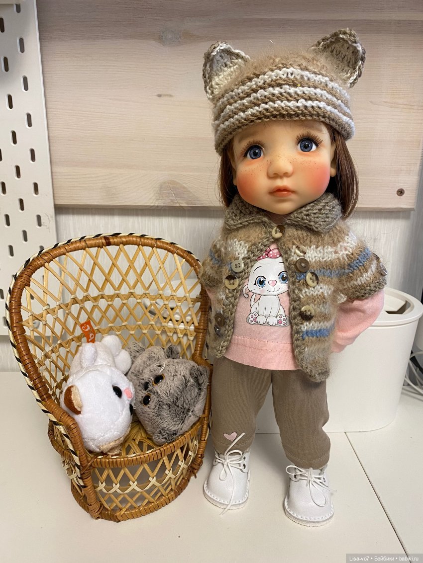 Три пушистых маленьких котенка (фото 9)