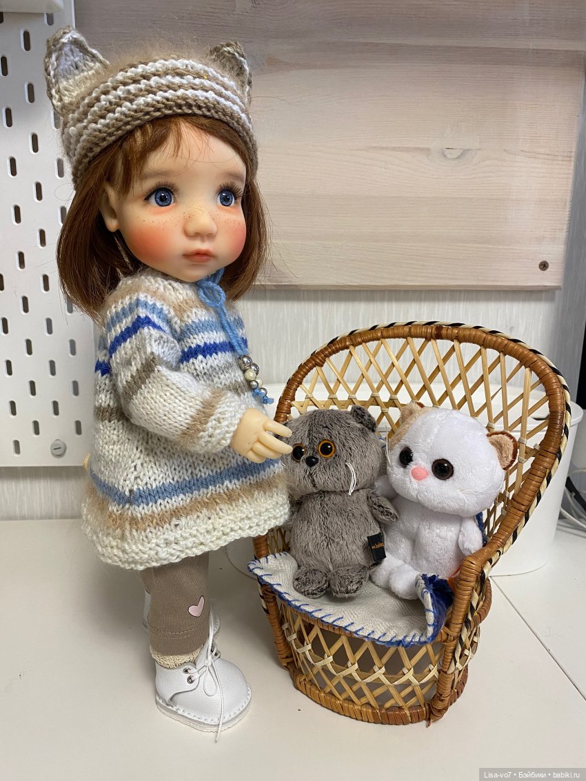 Три пушистых маленьких котенка