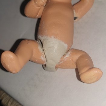 Ремонт фарфорового пупсика.