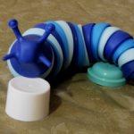 Кольчатый псевдослизень игрушка антистресс