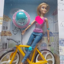 Барби шарнирная на велосипеде