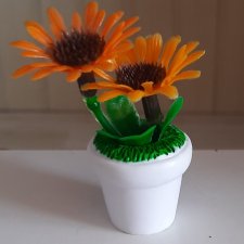 Цветы в горшочке