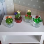 Кактусы в горшочках