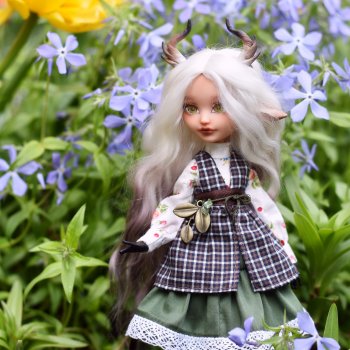 Козочка и цветы