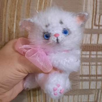 Белоснежный комочек