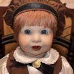 Фарфоровая кукла мальчик