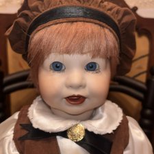 Фарфоровая кукла мальчик