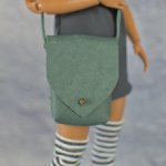 Темно-зеленая сумочка из тонкой кожи