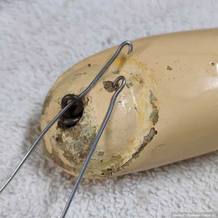 Как достать петельку крепления из ноги пресс-опилочной куклы (фото 2)