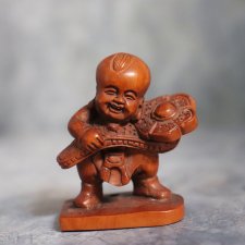 Нэцкэ "Ребенок Карако с жезлом жуи" .Винтаж!