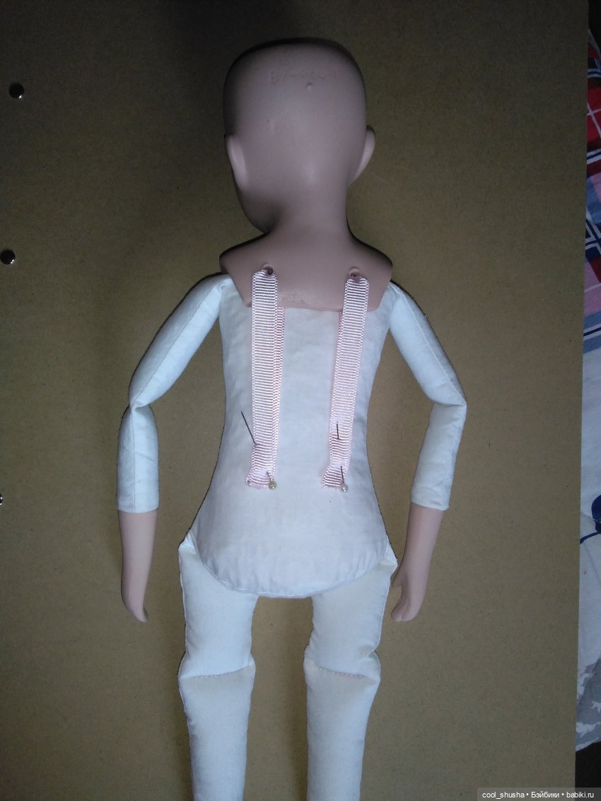 закрепила булавками