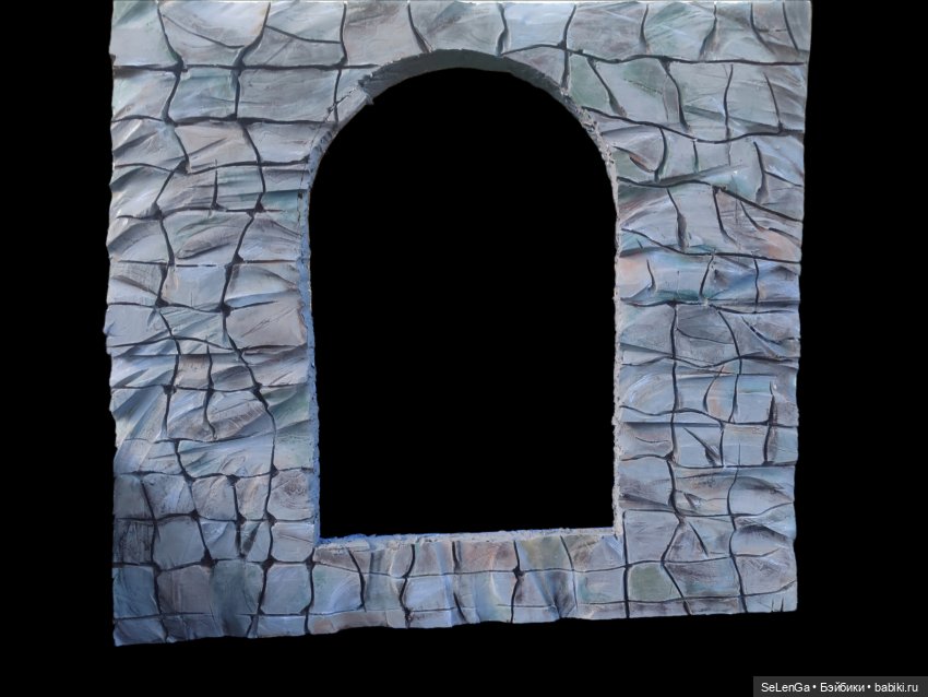 Каменная стена из пенополистерола и паяльник для макетирования