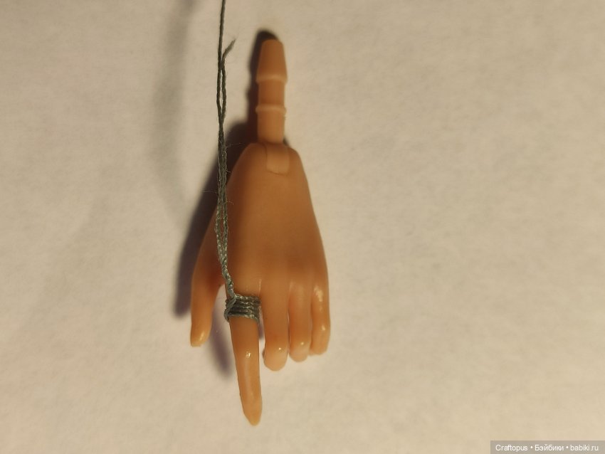 Как измерить диаметр пальца куклы с помощью линейки и нитки (фото 2)