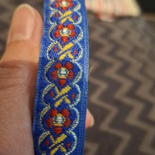 Тесьма с вышивкой вискозным шелком