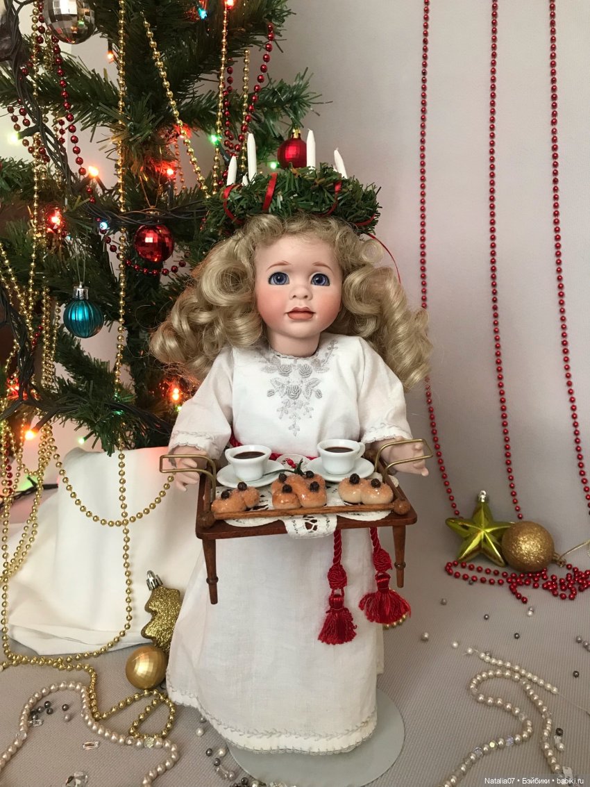 Праздник в Швеции, когда девушки надевают венок со свечами