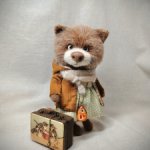 Кошечка с чемоданом