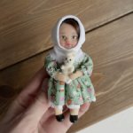 Коллекционная кукла с игрушкой